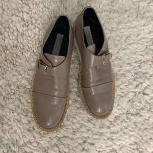 Stella McCartney studded slip ons with dust bag